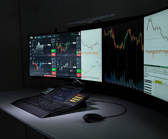 Trading workplace with WEYTEC smartTOUCH keyboard and multiple screens